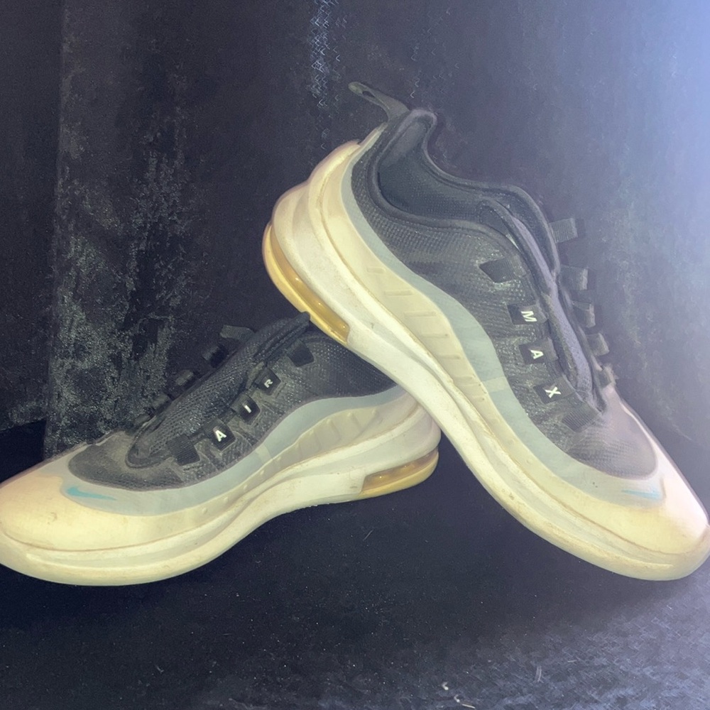Black and White Athletic Shoes with Dynamic Sole Design